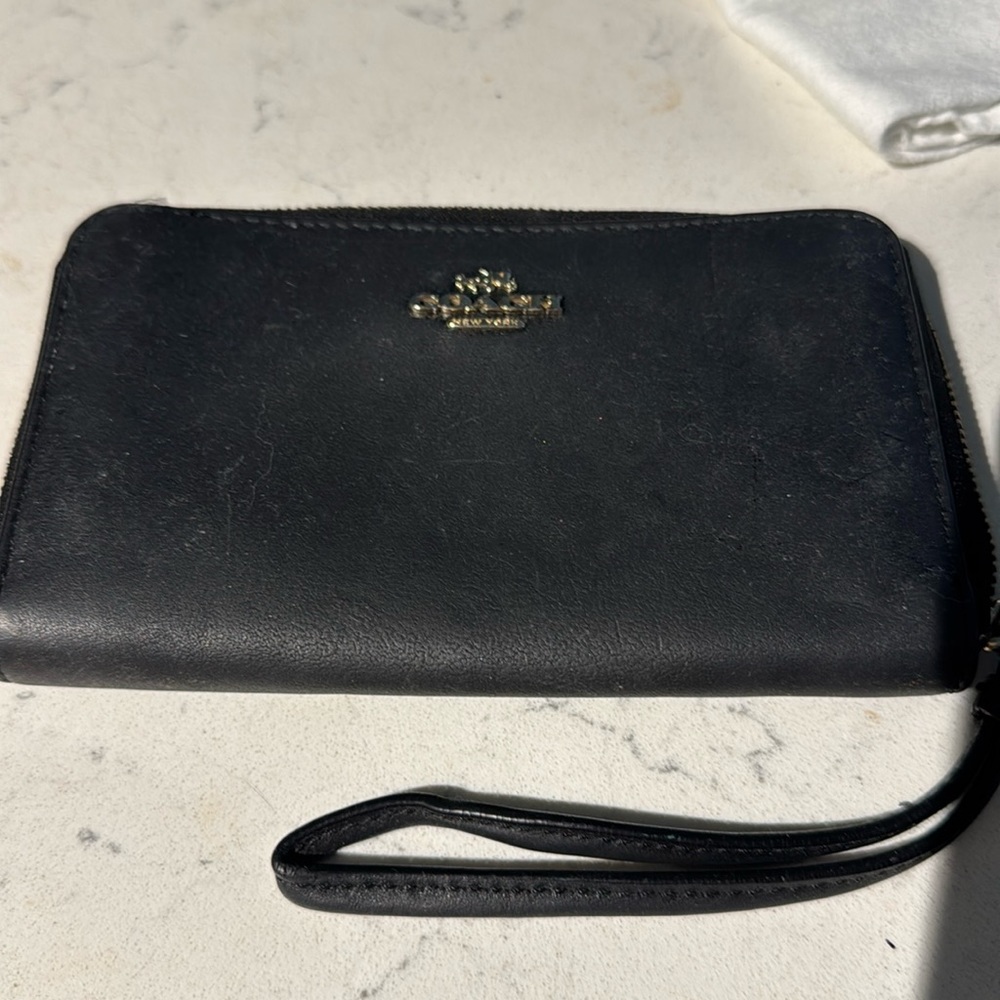 Small Coach wristlet.